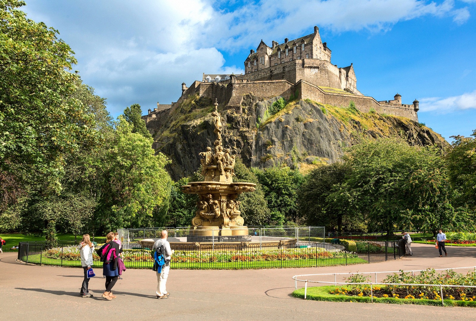 Edinburgh Castle on Castle Rock above the Ross Fountain in Princes Street Gardens