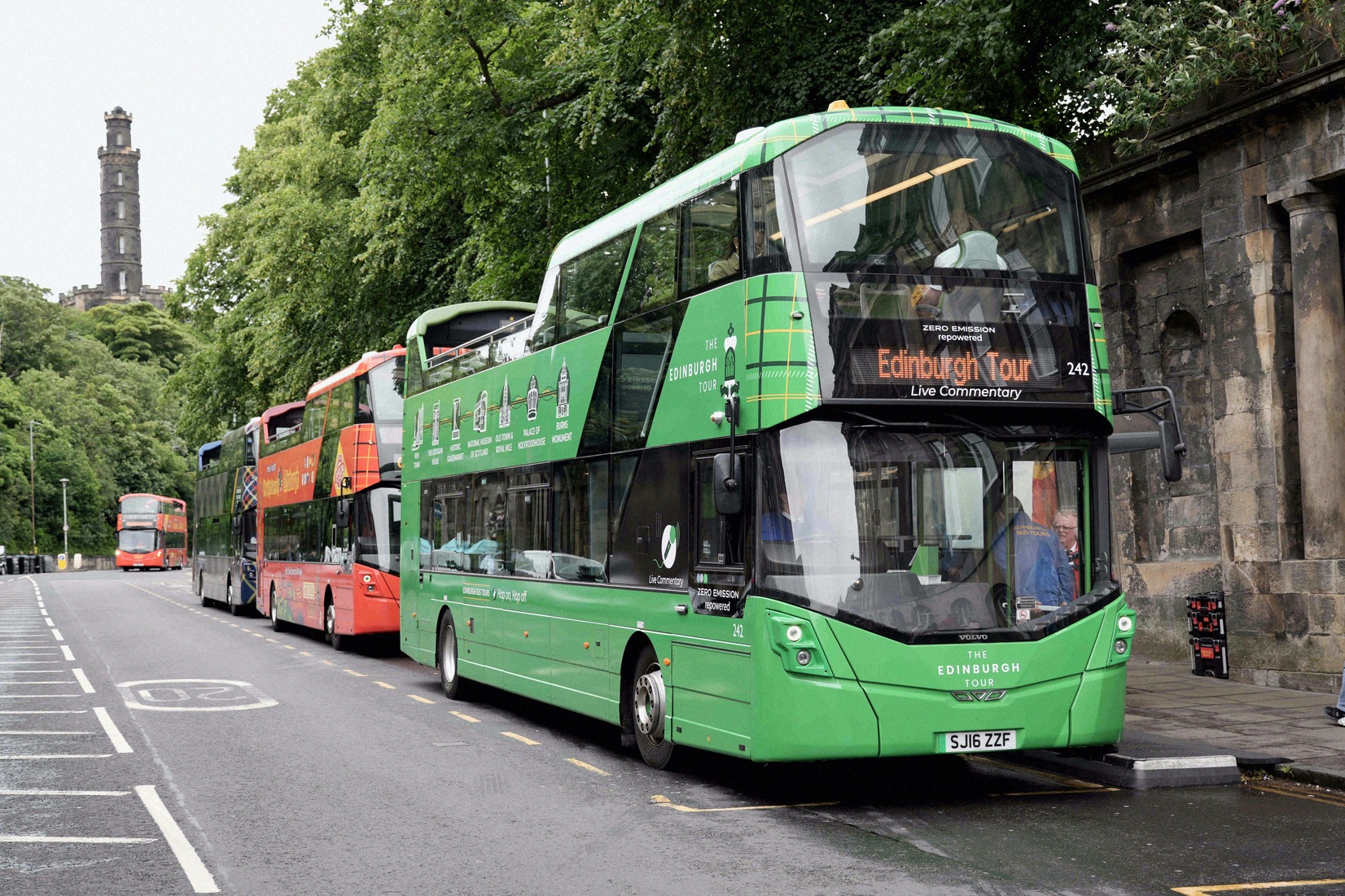 Edinburgh Tour double-decker buses waiting at Waterloo Place
